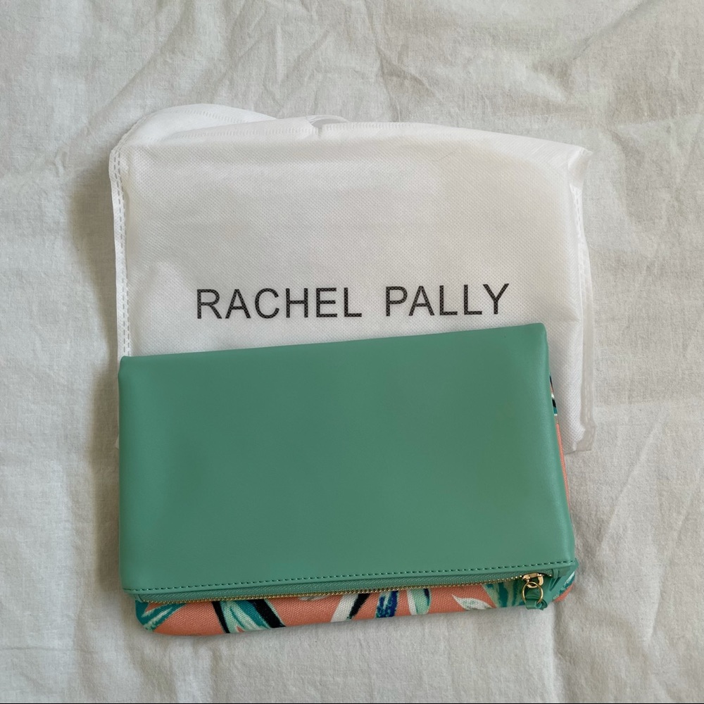 Rachel Pally teal leather foldover clutch with floral design.